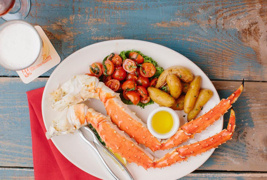 Wild Bering Sea King Crab Legs (1 lb) · served with drawn butter and choice of two (2) sides