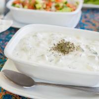 3. Mast-o-Khiar · A Yogurt mix of Cubed Cucumber, Fresh Dill and Dried Mint, Served with Lavash Bread