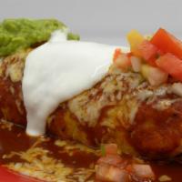 Star Burrito  · Meat Rice Beans topped with enchilada sauce Cheese guacamole sour cream & Salsa