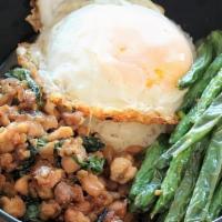 Gai Grapao · stir-fried holy basil chicken, onions, bird's eye chili, fried egg