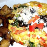 Greek Omelette · Feta cheese, spinach, bell peppers, onion and tomatoes.