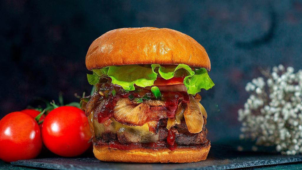 It's BBQ Time · BBQ sauce, Applewood smoked Bacon, 8 Oz burger, lettuce, tomato, red onion, gluten free bun.