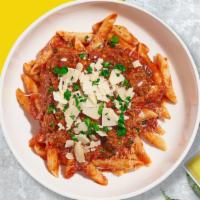 Bolognese Nights · Spicy tomato based sauce with plenty of ground beef tossed with gluten free penne.