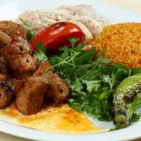 Lamb Kabab Meal (Rice & Salad) · Fresh off the grill Lamb skewers served on a bed of rice with a side salad.