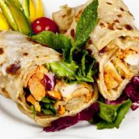 Crispy Chicken Wrap · Grilled wrap made with Crispy chicken, tomatoes, cucumbers, lettuce, onions, and mayo.