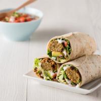 Falafel Wrap With Cheese & Jalapeños · Grilled wrap made with Falafel, cheese, jalapeños, tomatoes, cucumbers, lettuce, onions, and...