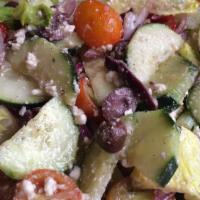 Greek Salad · Romaine lettuce, cucumber, cherry tomatoes, red onion and kalamata olives. Tossed in our hou...