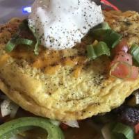 Vegetable Omlette · Swiss and Cheddar cheese, sautéed mushrooms, onion and bell peppers. Topped with tomato slic...