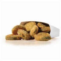 Fried Zucchini · Crispy bites of breaded zucchini. Served with house dressing.