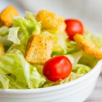 House Salad · Romaine lettuce, croutons, grape tomatos.

Your choice of Italian, blue cheese, ranch or tho...