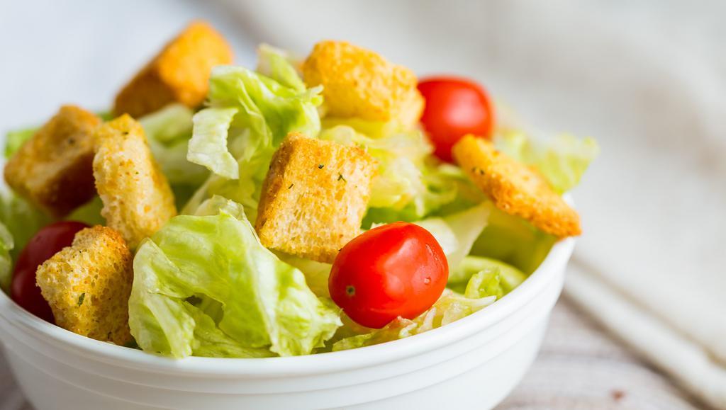 House Salad · Romaine lettuce, croutons, grape tomatos.

Your choice of Italian, blue cheese, ranch or thousand island dressing. (Vegetarian)