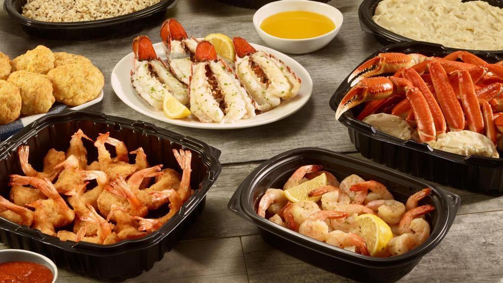 Ultimate Family Feast™ · Tender Maine lobster tails, wild-caught North American snow crab legs, our signature hand-crafted garlic shrimp scampi and Walt's Favorite Shrimp. Served with lemon, melted butter, cocktail sauce, two family-size sides and 8 Cheddar Bay Biscuits®. Serves 4.. 6030 Cal - 8970 Cal