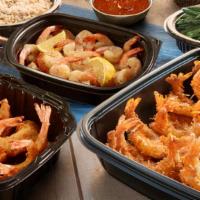 Create Your Own Family Feast · Your choice of three seafood favorites and two family-style sides. Includes 8 Cheddar Bay Bi...
