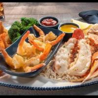 Ultimate Feast® · Tender Maine lobster tail, wild-caught North American snow crab legs, our signature hand-cra...