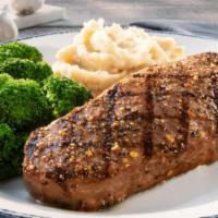 12 Oz. Ny Strip** · Simply seasoned with peppercorn. Served with choice of two sides.. 600 Cal