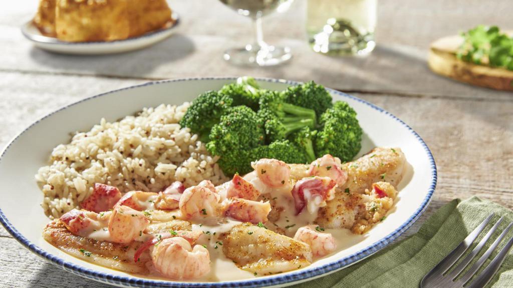 New! Lobster-Topped Stuffed Flounder · Wild-caught flounder roasted with our signature seafood stuffing and topped with Maine and langostino lobster in a creamy lobster beurre blanc. Served with choice of sides.. 510 Cal