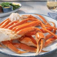 Wild-Caught Snow Crab Legs · Crack into tender, snow-white North American crabmeat. Served with lemon, melted butter and ...