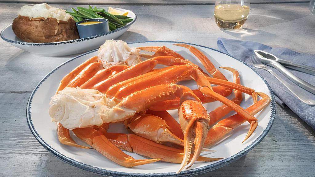 Wild-Caught Snow Crab Legs · Crack into tender, snow-white North American crabmeat. Served with lemon, melted butter and choice of two sides.. 440 Cal