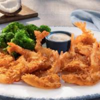 Parrot Isle Jumbo Coconut Shrimp · Hand-dipped, tossed in flaky coconut and fried golden brown. Served with our signature piña ...