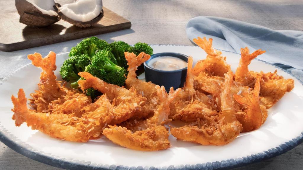 Parrot Isle Jumbo Coconut Shrimp · Hand-dipped, tossed in flaky coconut and fried golden brown. Served with our signature piña colada sauce and choice of two sides.. 1220 Cal