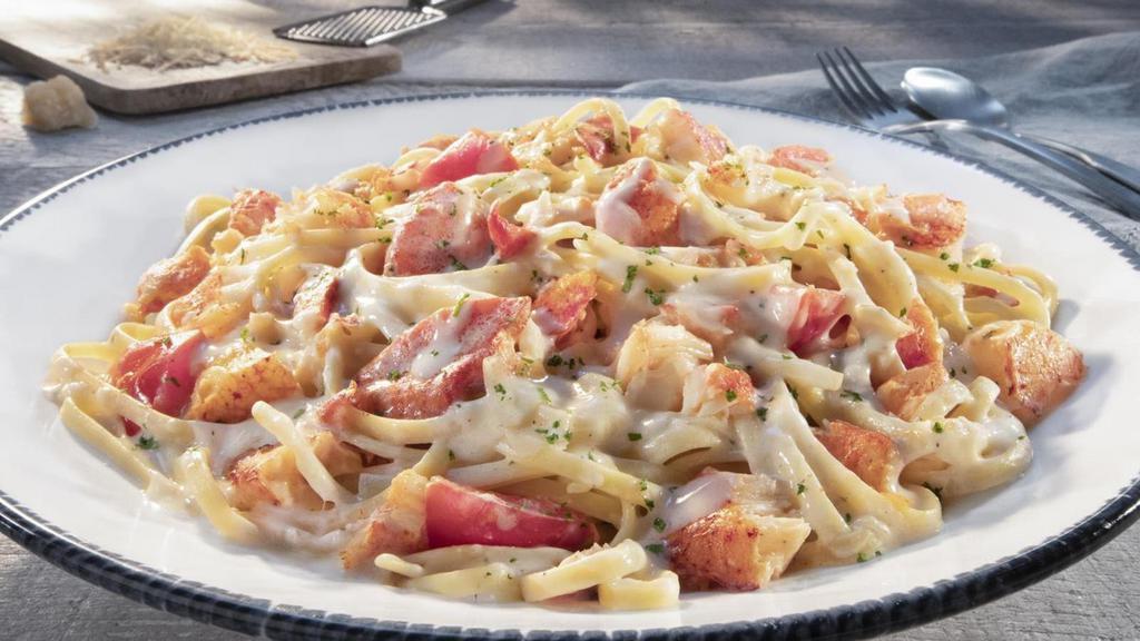 Lobster Linguini · Tender Maine lobster meat tossed with tomatoes and linguini in a creamy lobster sauce.. 1120 Cal