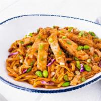 Kung Pao Noodles With Chicken · Tender chicken in a sweet and spicy soy-ginger sauce with edamame, cabbage, crispy onions, c...