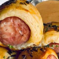 Sausage Bites · Bratwurst Happen, smoked curry dip