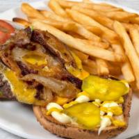Bacon Cheeseburger · Hearty angus beef patty with creamy cheese, crispy bacon loaded onto toasted buns, served wi...
