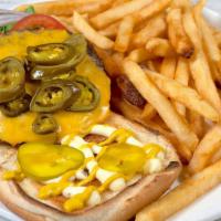 Jalapeno Cheeseburger · Hearty angus beef patty with creamy cheese, and jalapeno loaded onto toasted buns, served wi...
