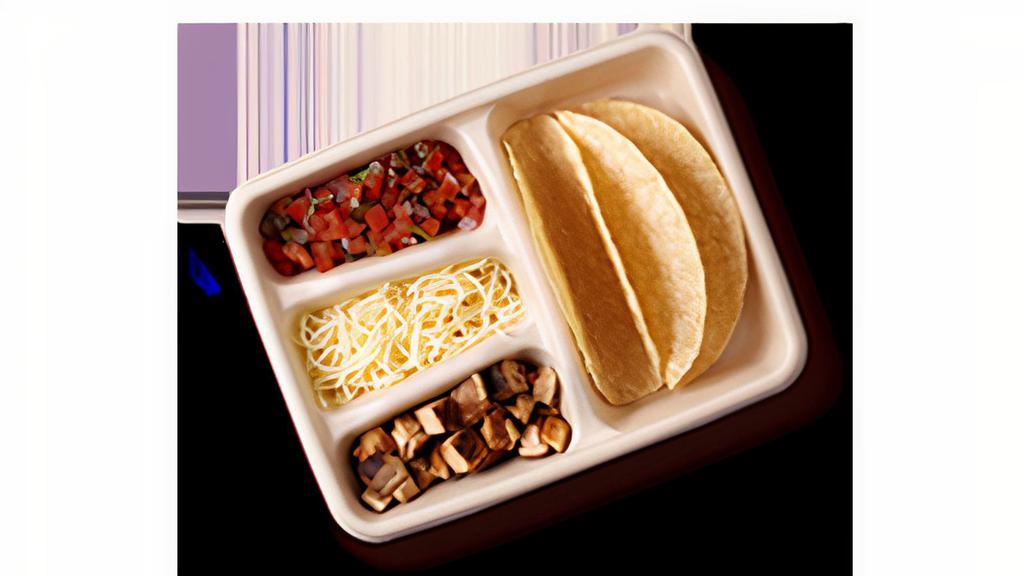 Kid'S Build Your Own · Your choice of meat, guacamole or queso, and two toppings to go with a pair of crispy corn or soft flour Tortillas.Includes fruit or kid's chips and organic juice or milk.