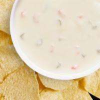 Large Chips & Large Queso Blanco · 