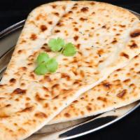 Plain Naan · Bread baked in a clay oven.