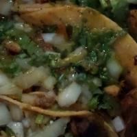 Tacos De Plaza · Favorite. Three small soft corn tortilla with your choice of meat topped with cilantro, onio...