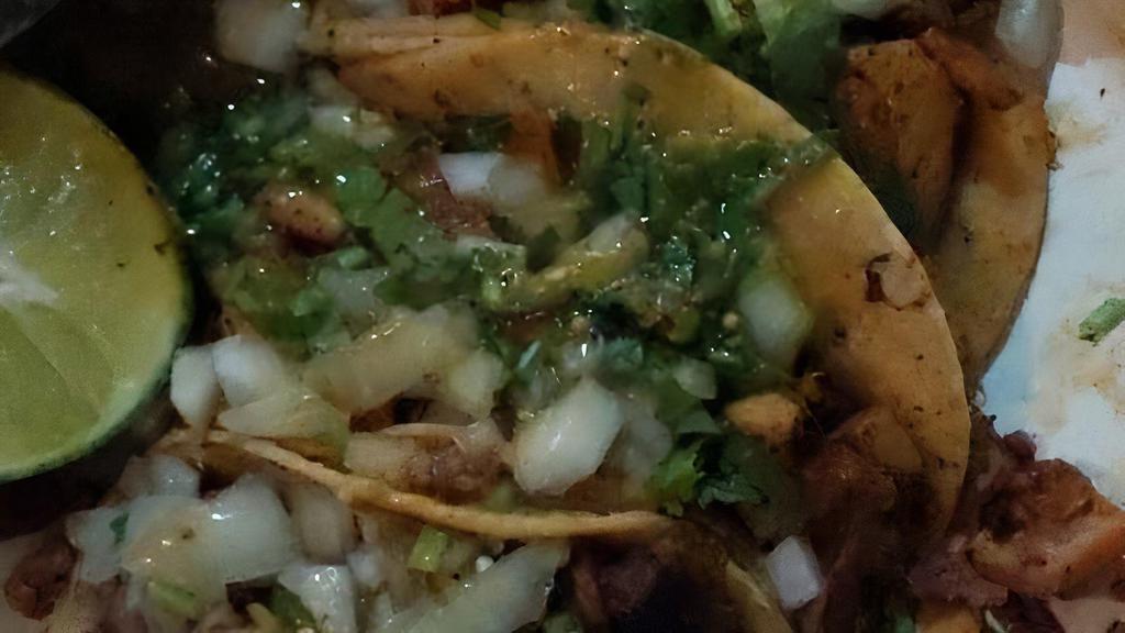 Tacos De Plaza · Favorite. Three small soft corn tortilla with your choice of meat topped with cilantro, onions, grilled tomatillo salsa and lime.