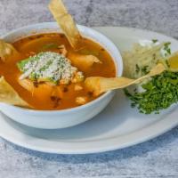 Sopa De Tortilla · Tortilla vegetable soup. Add chicken breast for an additional charge.