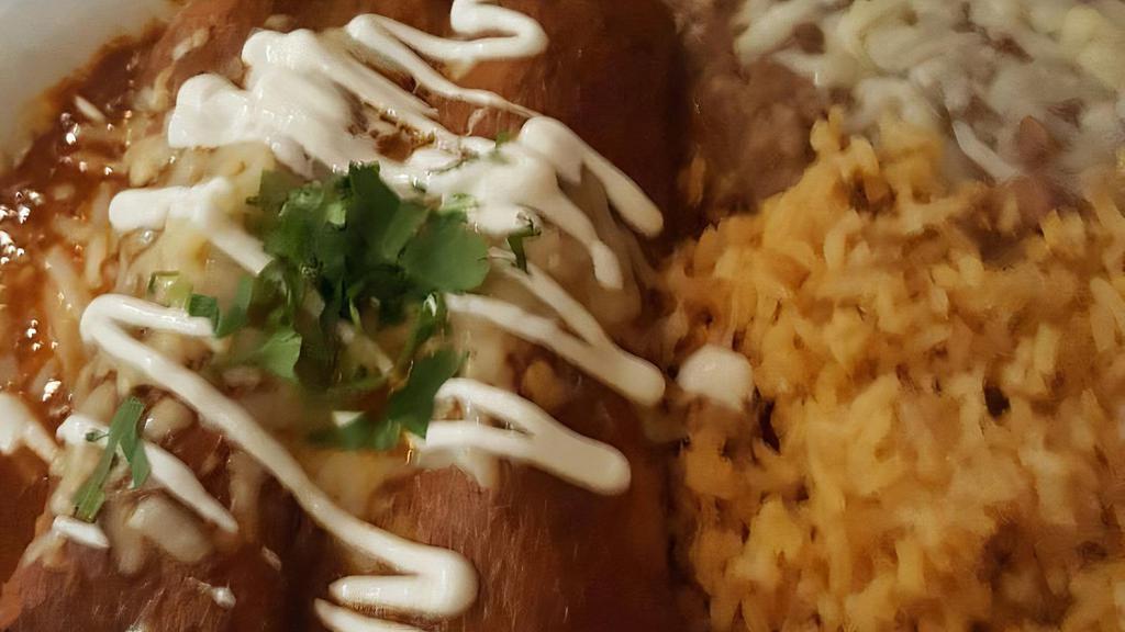 Enchiladas · Favorite. Shredded chicken or beef braised in dried chiles, grilled vegetables or carnitas. Topped with green tomatillo sauce or a red chile ancho sauce, Jack cheese, queso fresco and sour cream.