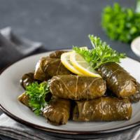 Dolma (3) · Grape leaves stuffed with rice.