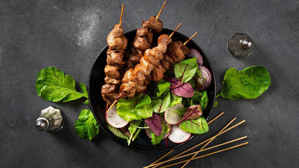 Ground Chicken Shish Kabab · Chicken served with rice, green salad