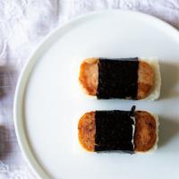 Portuguese Sausage Musubi · A block of rice with your choice of meat wrapped in dried seaweed.