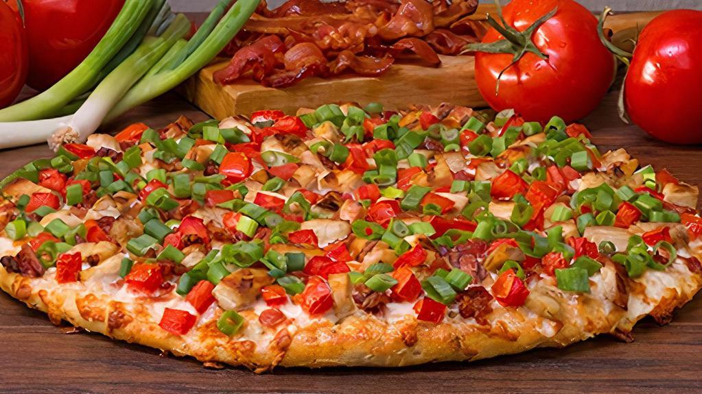 Chicken Club-Large · Better than a BLT. Loaded with grilled chicken, crisp bacon, diced tomatoes and green onions on our creamy garlic sauce. - (150-390 cal./slice)