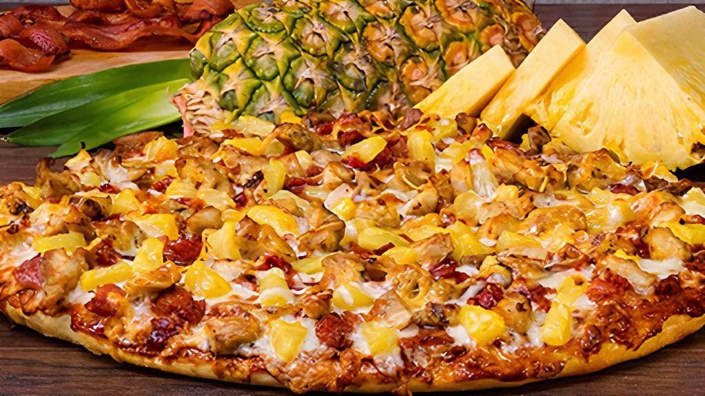 Hilo-Small · The Hawaiian Supreme, A perfect blend of pineapple, bacon, black olives, our classic pepperoni, mozzarella and cheddar cheeses with red sauce. On a thin crust.