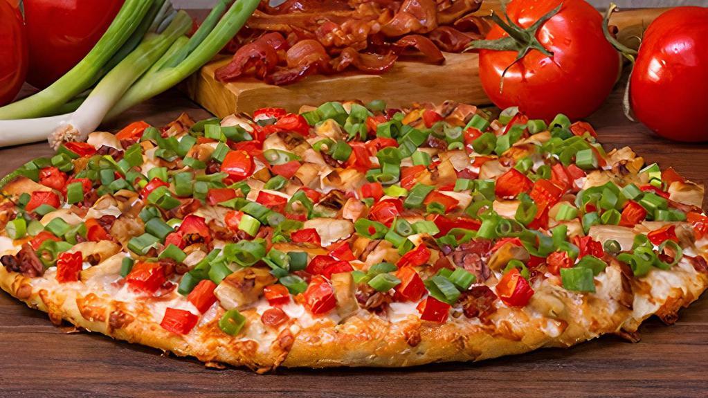Chicken Club-Medium · Better than a BLT. Loaded with grilled chicken, crisp bacon, diced tomatoes and green onions on our creamy garlic sauce. - (150-390 cal./slice)