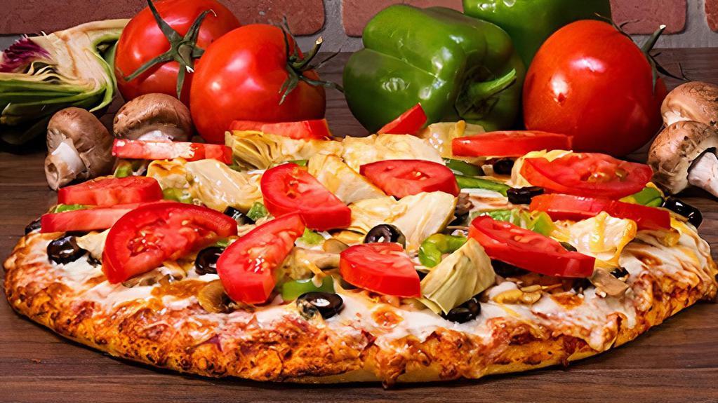 Mt. Veggiemore-LARGE · A Vegetarian Landmark! Loads of mushrooms, black olives, bell peppers, artichoke hearts and sliced fresh tomatoes on classic red sauce. - (90-310 cal./slice)