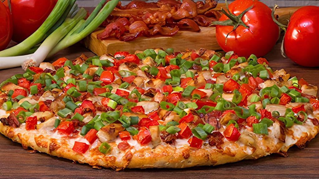 Chicken Club-Mini · Better than a BLT. Loaded with grilled chicken, crisp bacon, diced tomatoes and green onions on our creamy garlic sauce. - (150-390 cal./slice)