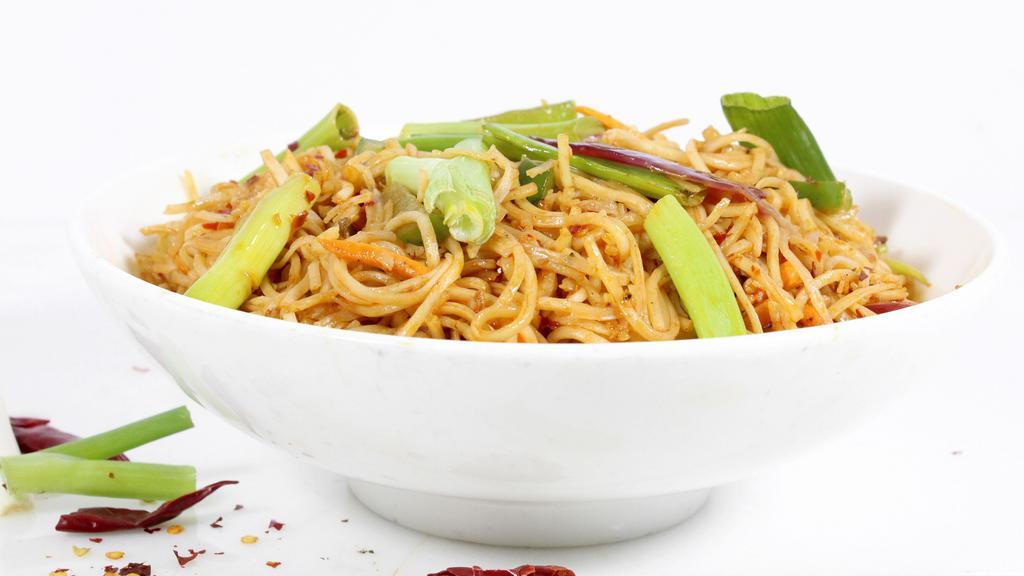 Chili Garlic Noodle · Very spicy. Thin eggless noodle, shredded vegetables, garlic, chili.
