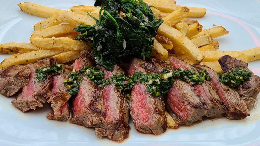 Steak Frites · 6oz Flank Steak with Chimichurri, served with Kennebec Fries and Roasted Garlic Tomato