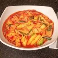 Duk Bok Ee / 떡볶이 · Spicy. Stewed sliced rice cake served with four side dishes.
