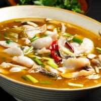 Fish Boiled in Szechuan Pickled Mustard Broth 酸菜魚 · Spicy.