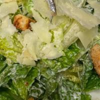 Caesar Salad · Hearts of romaine, Spanish white anchovy, house crouton, shaved Parmesan.