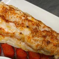 Maine Lobster Tail · 9oz Maine lobster tail, Clarified butter, jasmine rice.